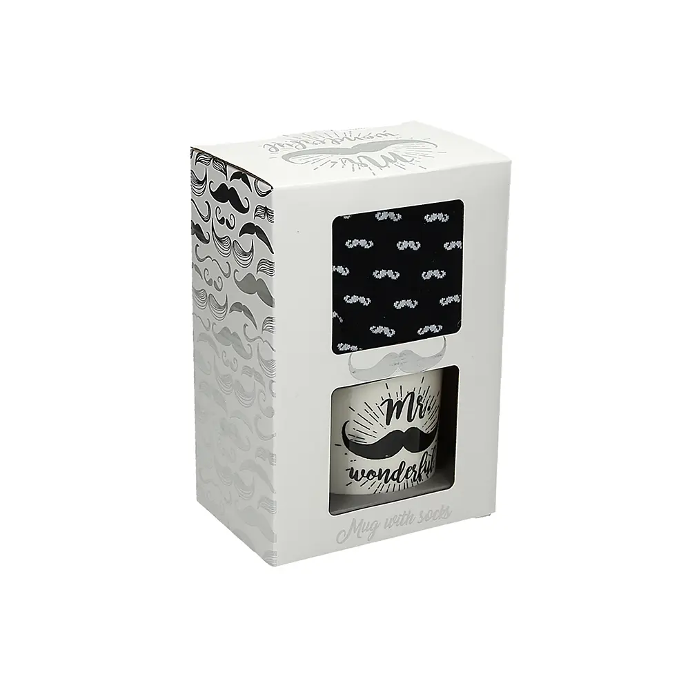 Nogavice in keramična skodelica moško